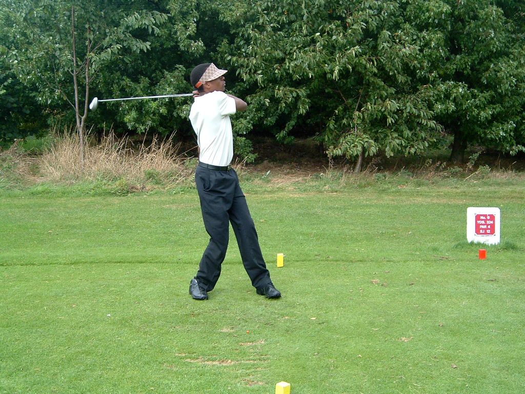 Jabunong at the top of his follow-through with driver at Stockwood Park